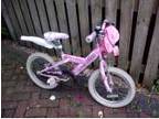 Pink girls' bike approx age 5-7 with bell & bag
